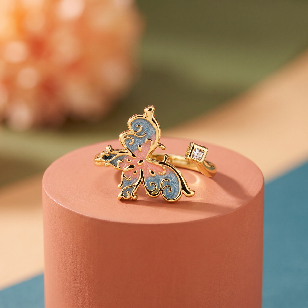 Dusty blue swirl enamel butterfly ring with square crystal, antique gold-toned adjustable